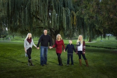 A family picture outdoors on  location by Addison Photography.
