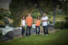 A family picture outdoors on  location by Addison Photography.