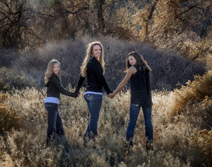 A family picture outdoors on  location by Addison Photography.